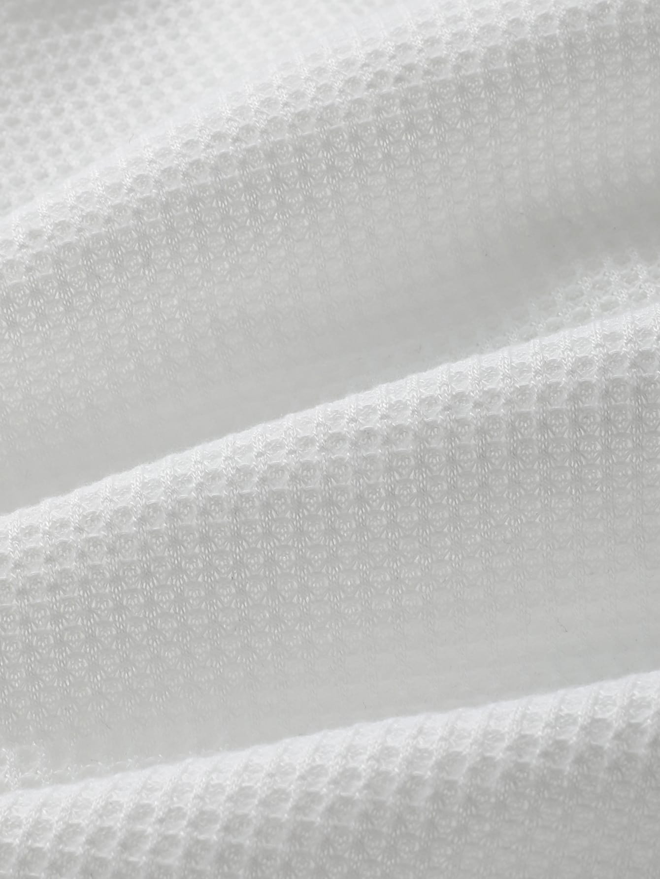 Waffle Knit Asymmetrical Hem Solid Tee