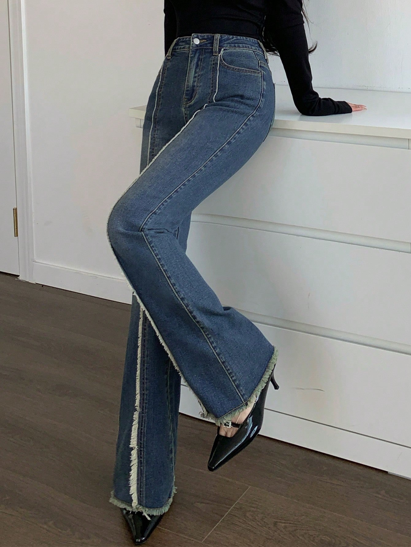 Flared Jeans With Frayed Hem